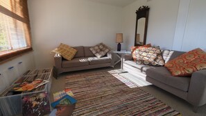 Open plan living space #sistersbeachhouse