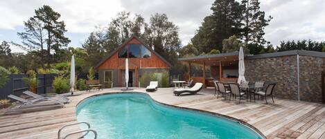 The Pool House and pool area is a great spot to  relax with friends. 