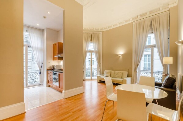 Reception room with kitchen to the side