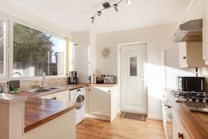 Well equipped kitchen with dishwasher, washer/dryer, cooker, hob, microwave, toaster, kettle, fridge freezer, coffee machine and everything you need to cook your own meals!