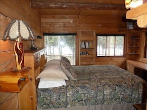 Queen bed in Master bedroom, built in desk and cabinets, remote TV-DVD-VCR.