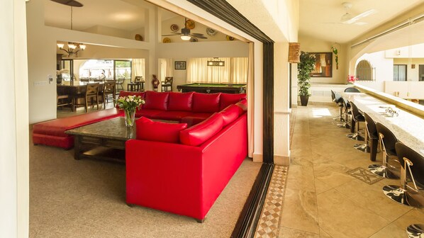 Looking into the Great Room from the outside terrace .