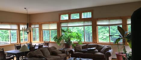 Upstairs Living Room. Panoramic views of the private woods