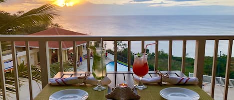 Enjoy a Refreshing Cocktail while watching the Amazing Sunset from our Balcony