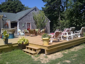 Spacious and sunny deck. Outdoor Shower.