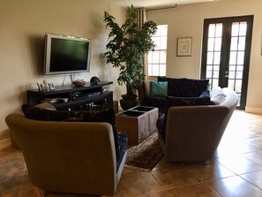Living Room with julienne balcony to the courtyard
