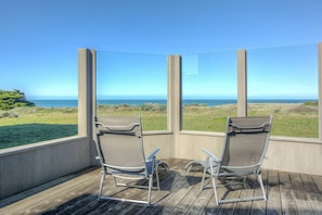 Deck with seating and ocean view