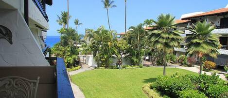 Lanai with courtyard & partial ocean view