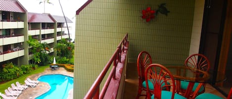 Lanai dining with view of pool