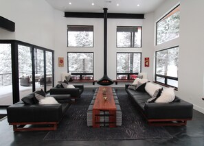 Lounge on the 10' Restoration Hardware sofa while watching skiers whizz by. 