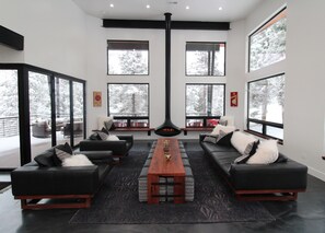 Lounge on the 10' Restoration Hardware sofa while watching skiers whizz by. 