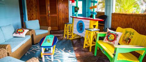 Enjoy our Margaritaville outdoor covered lounge and tiki area!