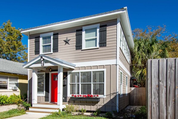 A bright flower box welcomes you home!