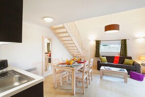 You will love to sit back and relax in the bright and cozy living room.
