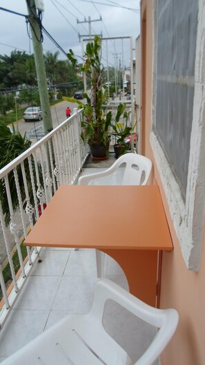 Enjoy dining on your private balcony.