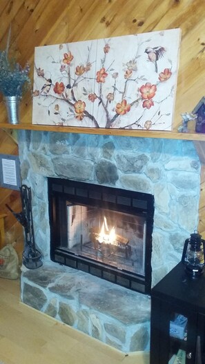 Warm up alongside this beautiful stone fireplace. Enjoy the crackle!