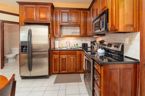 Well appointed kitchen with stainless appliances