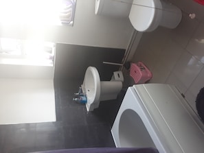 Shared bathroom and toilet. Ground floor