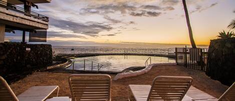 lounge on the sand beach by the Salt water pool.
