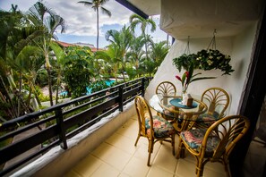 seating for 4 people outside, and an ocean view