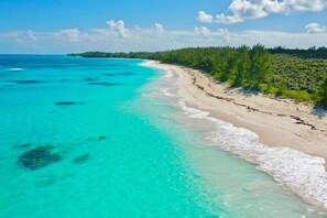 Our beach, Poponi Beach, a mile long stretch of pinkish sand.