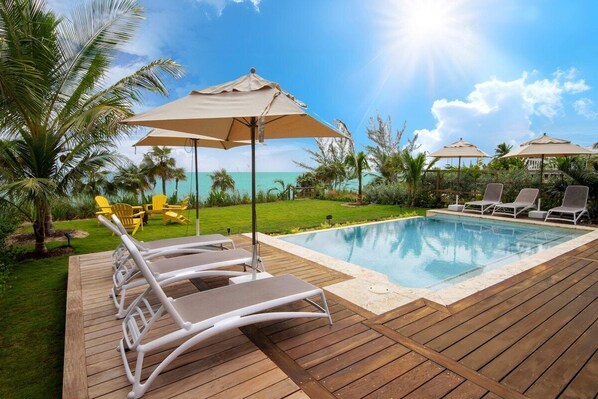 Welcome to Wild Orchid, a new beachfront villa with a heated private pool and resort privileges at La Bougainvillea, right next door.