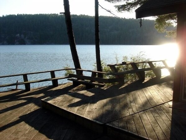 The front deck goes right up to the crystal-clear water.