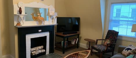Living room with Roku Flat Screen