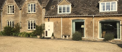 House with courtyard and guest front door