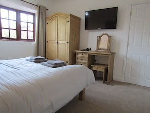 Master bedroom, towels provided as well as hairdryer.