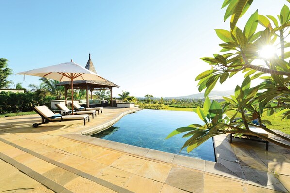 Lounge by your private pool in the sunshine.