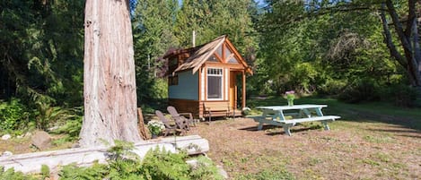 If you loved building forts and tree-houses as a kid, you will love the Micro Cabin!
