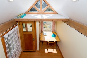 Snuggle up in the loft and pretend that you're in a treehouse.