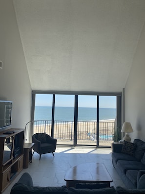 A view from our living room with new porcelain tile .and showing vaulted ceiling