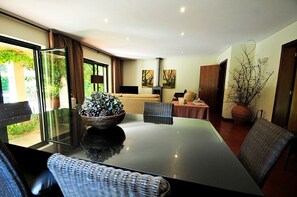 Dining room with patio doors to the swimming pool