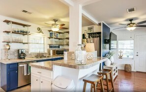 Elevate your culinary experience in this chic and functional kitchen