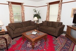 Village Suites Living room #1 Queen sleeper sofa and gas fireplace