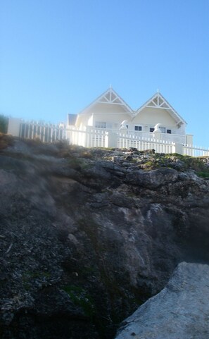 View from beach looking up at villa