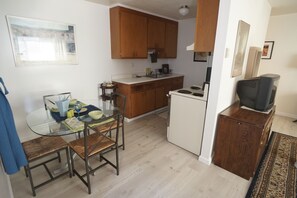 Dining area for 4 by the kitchen.