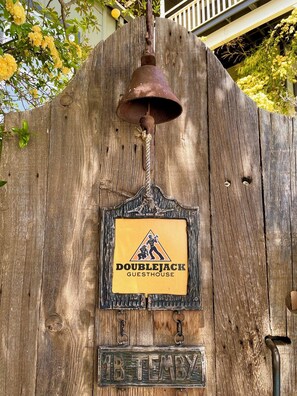 Front gate and bell.