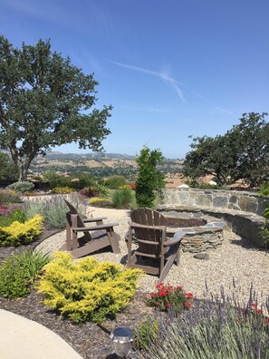 Park-like backyard with extra large natural gas firepit and bench!