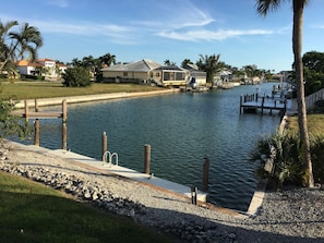 Big backyard, private dock to tie up boat or fish, beautiful long water view!