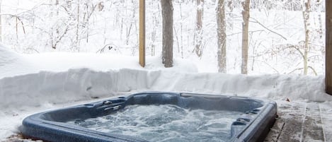 Unwind & relax in our covered hot tub...