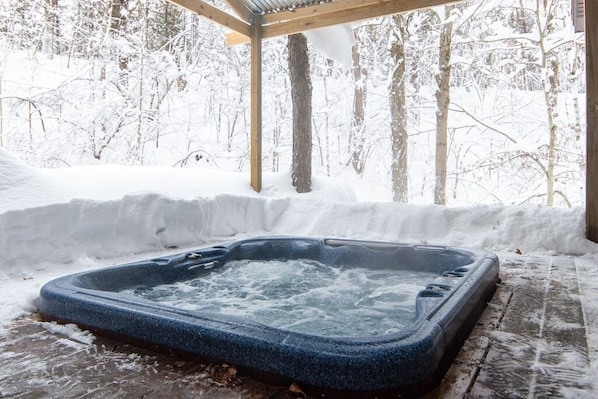 Unwind & relax in our covered hot tub...