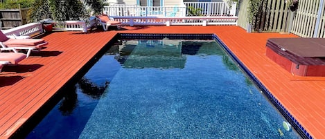 The pool with the villa behind. Both Atlantic ocean and Caribbean sea views.