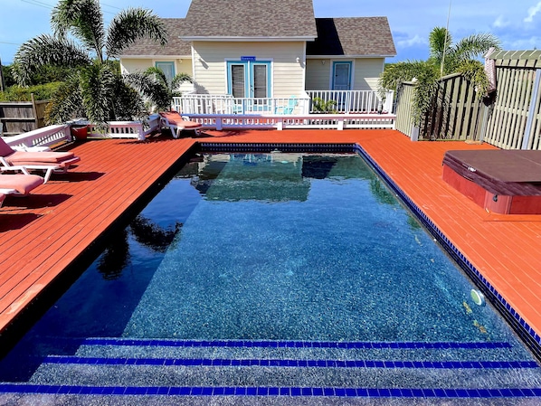 The pool with the villa behind. Both Atlantic ocean and Caribbean sea views.