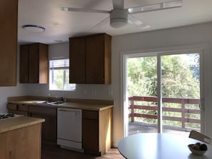 Kitchen area with expansive 
canyon views . Larger refrigerator and dishwasher .