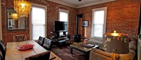 Open concept living room with gas stove