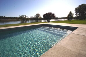 Breathtaking views from your private waterfront heated pool!