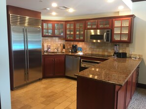 High end appliances with granite countertops.